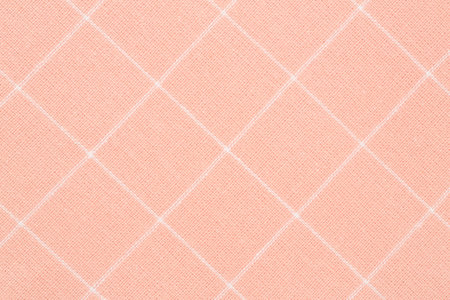 Pink kitchen towel texture as a background, vertical image.