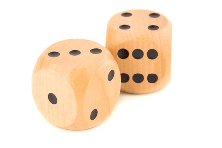 Two wooden dices isolated on white background.