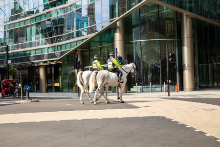 London, United Kingdom - September 18, 2021 - London Metropolitan Police on horses in the Ciry of...