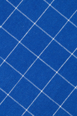 Blue kitchen towel texture as a background, vertical image.