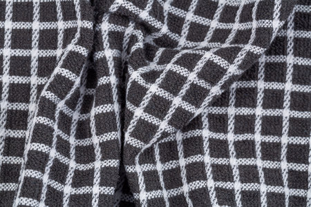 Black and white towel texture as a background.