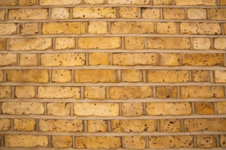 Old brick wall background, part oh historical building.