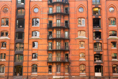 Old red bricks building with beautiful ornaments in historical warehouse district Speicherstadt in...