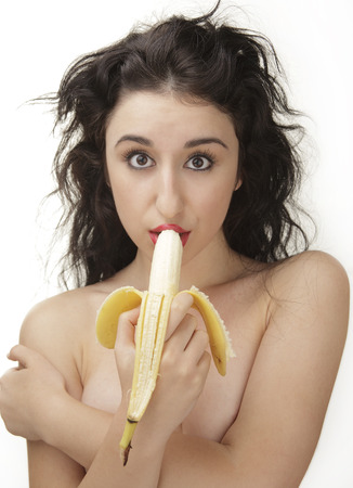 Sexy woman eating bananaの写真素材