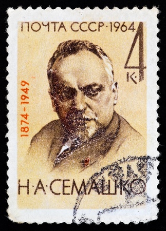 USSR - CIRCA 1964: The postal stamp printed in the USSR which shows Nikolai Aleksandrovich Semashko, CIRCA 1964.の写真素材