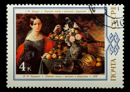 USSR - CIRCA 1983  The postal stamp printed in USSR is shown by the I F  Hrutsky  Portrait of the wife with colours flowers  and fruit , CIRCA 1983 のeditorial素材