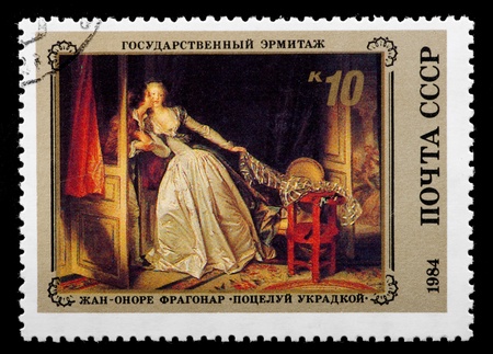 USSR - CIRCA 1984  The postal stamp printed in USSR is shown by the Jean-Onore Fragonard  The Kiss furtively , CIRCA 1984 のeditorial素材