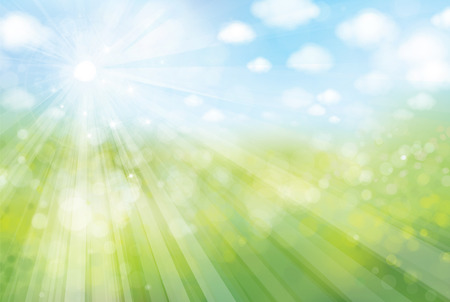 sunshine bokeh background, green field and blue sky.のイラスト素材