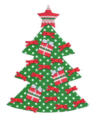 Handmade isolated Christmas tree decorated with star, ribbons and gifts.の写真素材