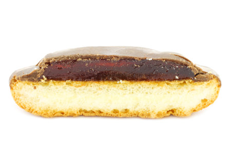 Piece of jelly cookie with chocolate glaze on a white background