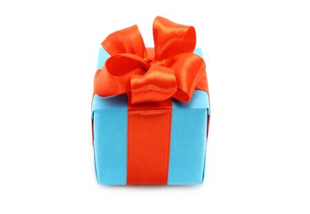 Present box with red bow on a white backgroundの写真素材