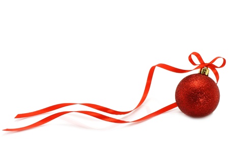 Red Christmas ball with ribbon on white background の写真素材