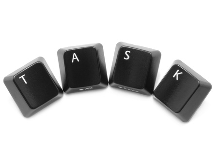 Keyboard keys made the word task on a white backgroundの写真素材
