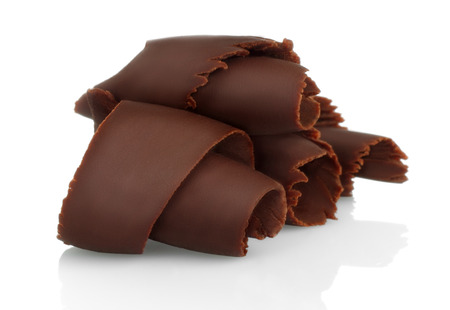 Chocolate shavings on white background close-upの写真素材