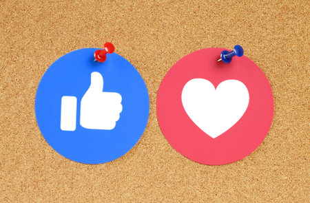 Kiev, Ukraine - November 28, 2018: Facebook Like and Love button of Empathetic Emoji Reactions...