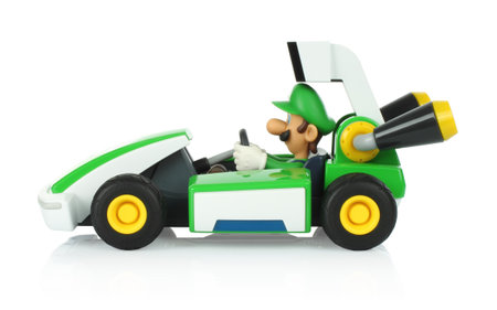 December 28, 2020: Toy kart from Mariokart Live Home Circuit video game, Luigi set, on white backgorund. Mariokart Live Home Circuit is video game developed and published by Nintendoのeditorial素材