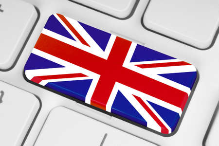 Button with Great Britain flag on white computer keyboard close-upの写真素材