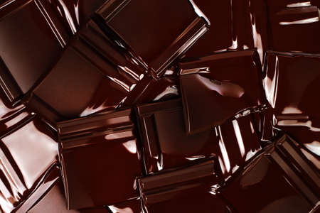Melted Dark Chocolate Bars background close-upの写真素材