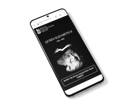 Kiev, Ukraine - September 09, 2022: Smart Phone with Official Royal Collection Trust website on its...