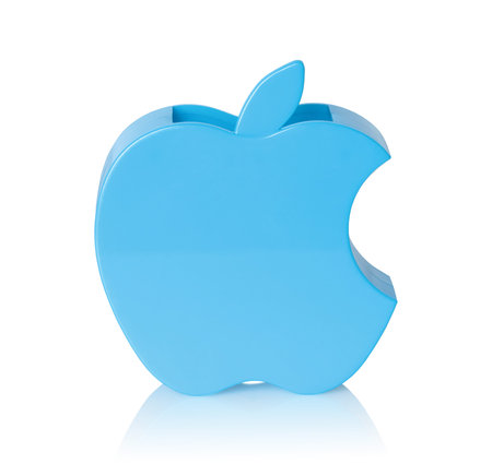 Pencil holder in the form of Apple Inc. brand logo, isolated on white backgroundのeditorial素材