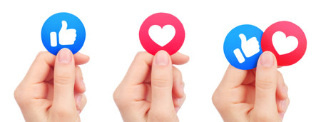 Set of Hands, which holds paper Facebook Like and Love Empathetic Emoji Reactions, isolated on a...