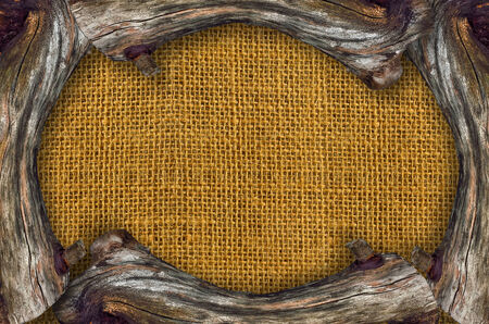 Old wooden frame with burlap material inside.の写真素材