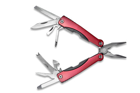 Multifunction pliers with red handles and a set of tools - isolated on white. Cute gift for the man...