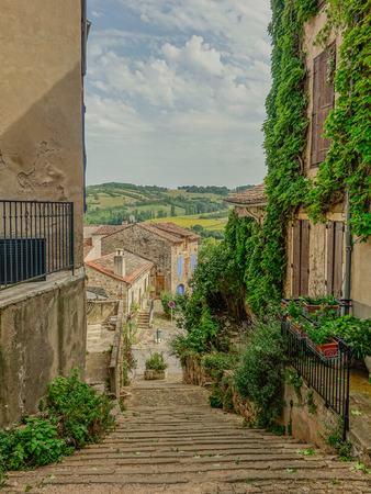 Typical narrow street of the village Cordes-sur-Ciel in Occitaniaのeditorial素材