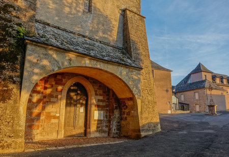 Sunset at the entrance of an old solitary church