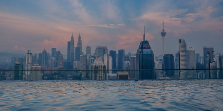Kuala Lumpur, Malaysia - March 16, 2018: Cityscape of Kuala Lumpur city skyline with hotel rooftop...