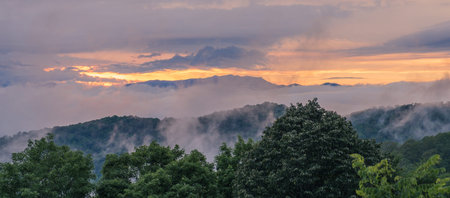 Great Smoky Mountains National Park, North Carolina, USA - June 23, 2018: Clouds between the mountains of the Great Smoky Mountains at sunsetのeditorial素材