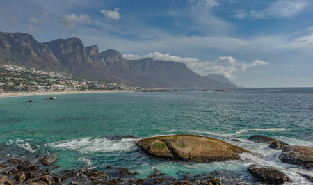 Camps Bay, Cape Town, South Africa - November 12, 2017: Sunset view of the mountain Twelve Apostles...