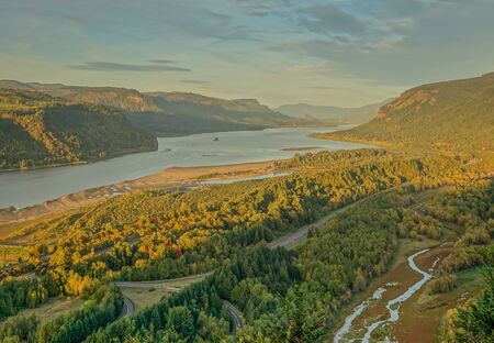 Columbia River Highway, Corbett in Oregon, USA - October 13, 2015: Panoramic view from Crown Point Vista House over the Columbia River Gorge in a sunsetのeditorial素材
