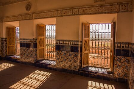 Ouarzazate, High Atlas, Morocco - January 15, 2014: Lights and shadows through three windows of the citadel on a sunny dayのeditorial素材
