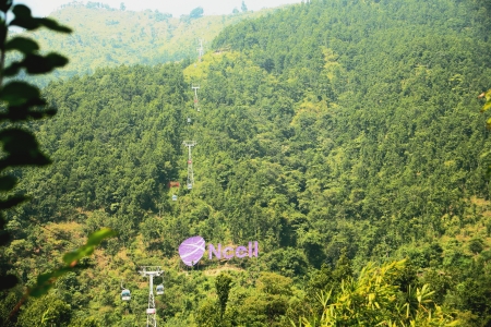 MANAKAMANA, NEPAL - OCTOBER 6  Telephone company s logo sponsors the 2 8 km long Manakamana cable car from Kurintar  258 ms   to the mountain top  1302 ms   on October 6, 2012  Gorkha District-Nepal のeditorial素材