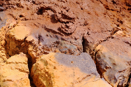 Detail-soil of Dallol mt.rising over the surrounding flat of Lake Karum-Assale. Colored deposits of sylvite -KCL- carnallite -KMGCL3.6(H2O)- and kainite -KMG(SO4)CL.3H20-. Danakil-Afar region-Ethiopiaの写真素材