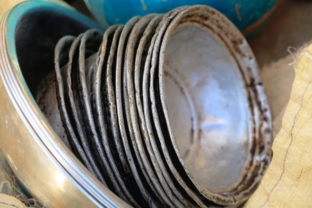 Set of old and new aluminum cooking bowls and washbowls for sale in the Adi Haki open market of Mek'ele-Mekelle town at 2084 ms.high in Debubawi-Southern zone. Tigray region-Ethiopia.の写真素材
