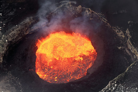 Bubbling burning lava lake inside the Mount Marum active crater in the 8x12km wide Ambrym island s volcanic caldera of the New Hebrides Volcanic Arch