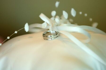 Wedding ring with silk bowの写真素材