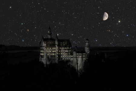 Castle Cinderella at night with moonの写真素材