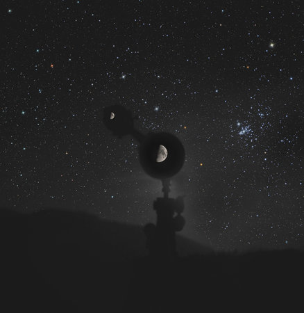 Telescope in front of dark sky with stars and moon