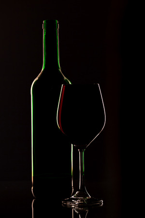Wine bottle with wine glassの写真素材