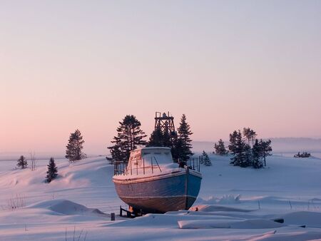 Little ship on coast of  White Sea, Russiaの写真素材