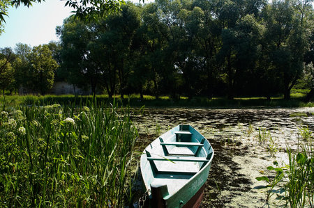 Boat on little river in Pereslavl'-Zalesskiy, Russiaの写真素材