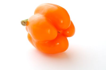 Orange sweet pepper on whiteの写真素材