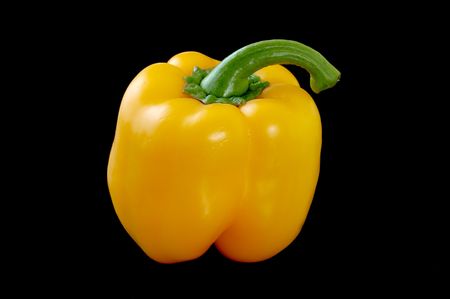 Yellow sweet pepper on blackの写真素材