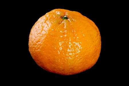 Tangerine isolated on black backgroundの写真素材