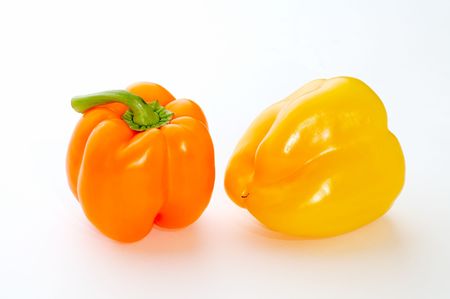 Two sweet peppers on whiteの写真素材
