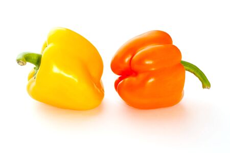 Two sweet peppers on whiteの写真素材
