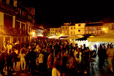 Crowded square in night Guimaraes During Feira Afonsina Festival Portugalのeditorial素材